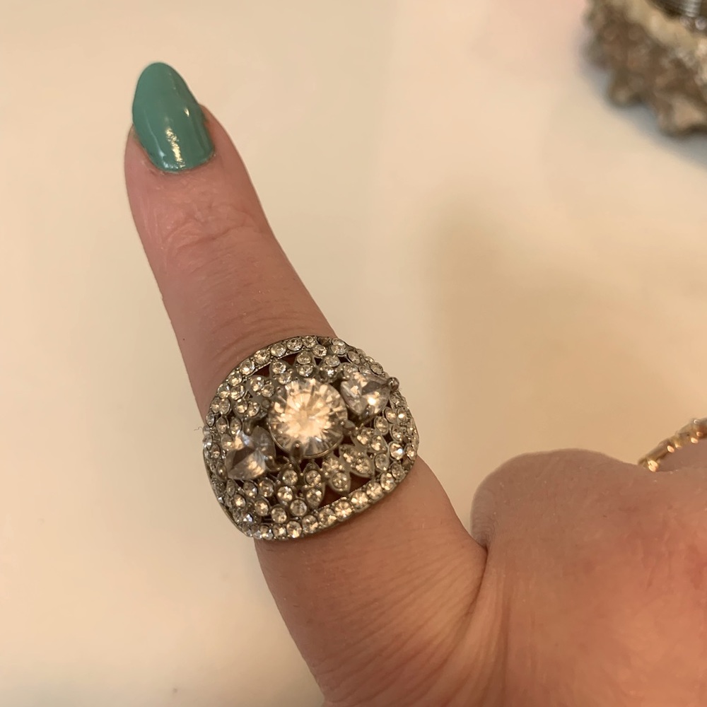 Very beautiful silver with crystal stones. Size 9